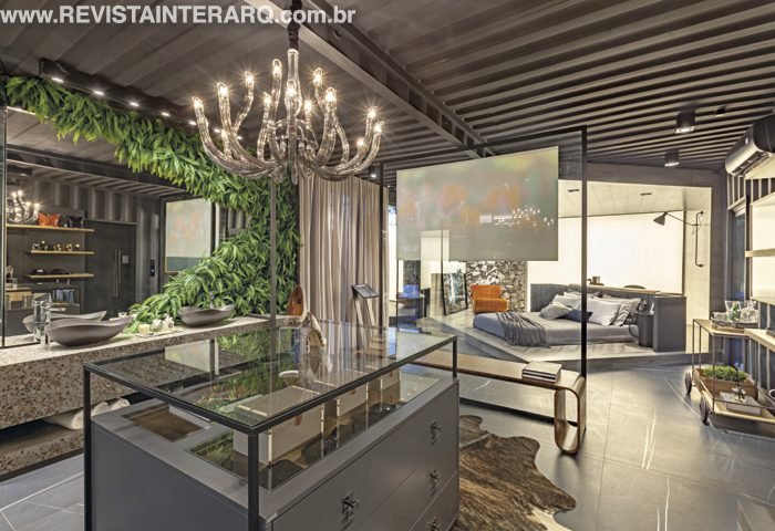 Studio e Banho do Casal por Hugo Rosa Arquitetura: R. Antônio José Martins Filho, 300, São José do Rio Preto/SP  (17) 99734-3730 e 98101-1011, hugorosa.arquitetura@gmail.com, www.hugorosaarquitetura.com.br, Q@hugorosa.arquitetura  Pisos, cubas, banheira e metais, Constru-Sol (17) 3253-9000 | Móveis planejados, Decora Móveis (17) 3363-6222 Painel de pedra e seixos, Pedregal (17) 3234-3557  | Tela tensionada iluminada, Lumilight (17) 3363-4200  Objetos de decoração e plantas artificiais, Vera Orsi (17) 3222-5310  Vidros e Espelhos, Auribox Esquadrias de Alumínio (17) 3482-3196 fotos_Estúdio Inside Art