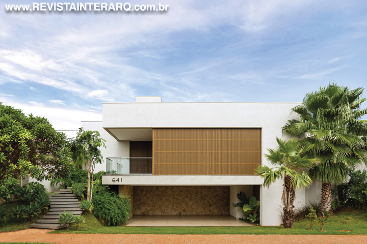 Esta residência conta com uma estrutura escultural e integração total entre sala e varanda - Revista InterArq | Arquitetura, Decoração, Design, Paisagismo e Lifestyle